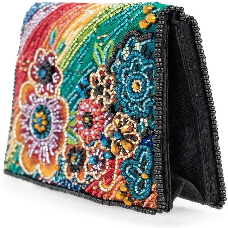 Wallet for various occasions, with rainbow floral design and multiple compartments. Mini clutch purse in multicolor.